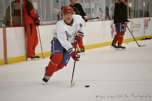 Washington Capitals player Michael Latta dancing with the puck. 